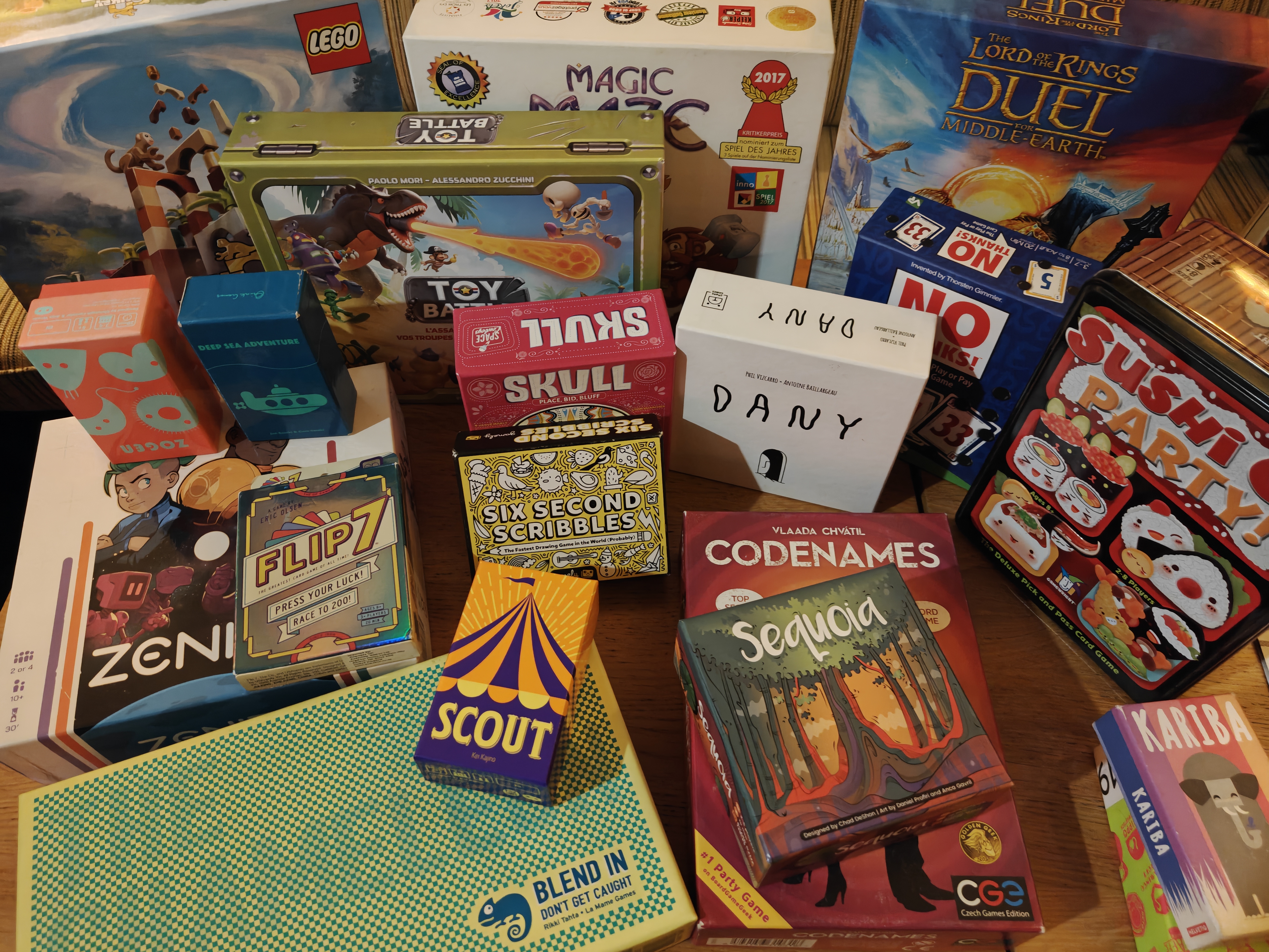 Beautiful modern board game components on an oak table